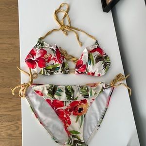 Guess floral bikini with shiny gold strings size medium